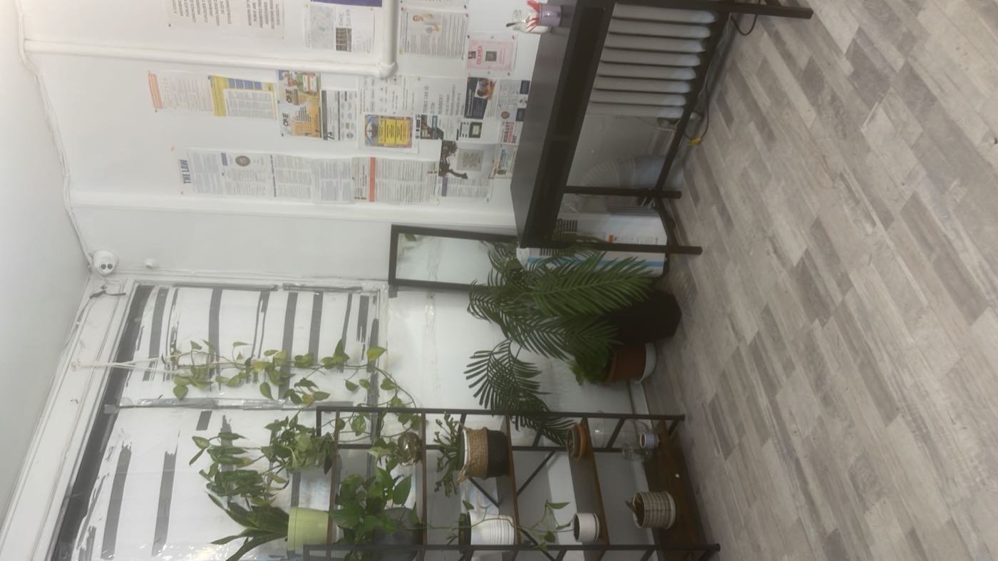 The Golden Rose office in Brooklyn, with the job posting board by the desk